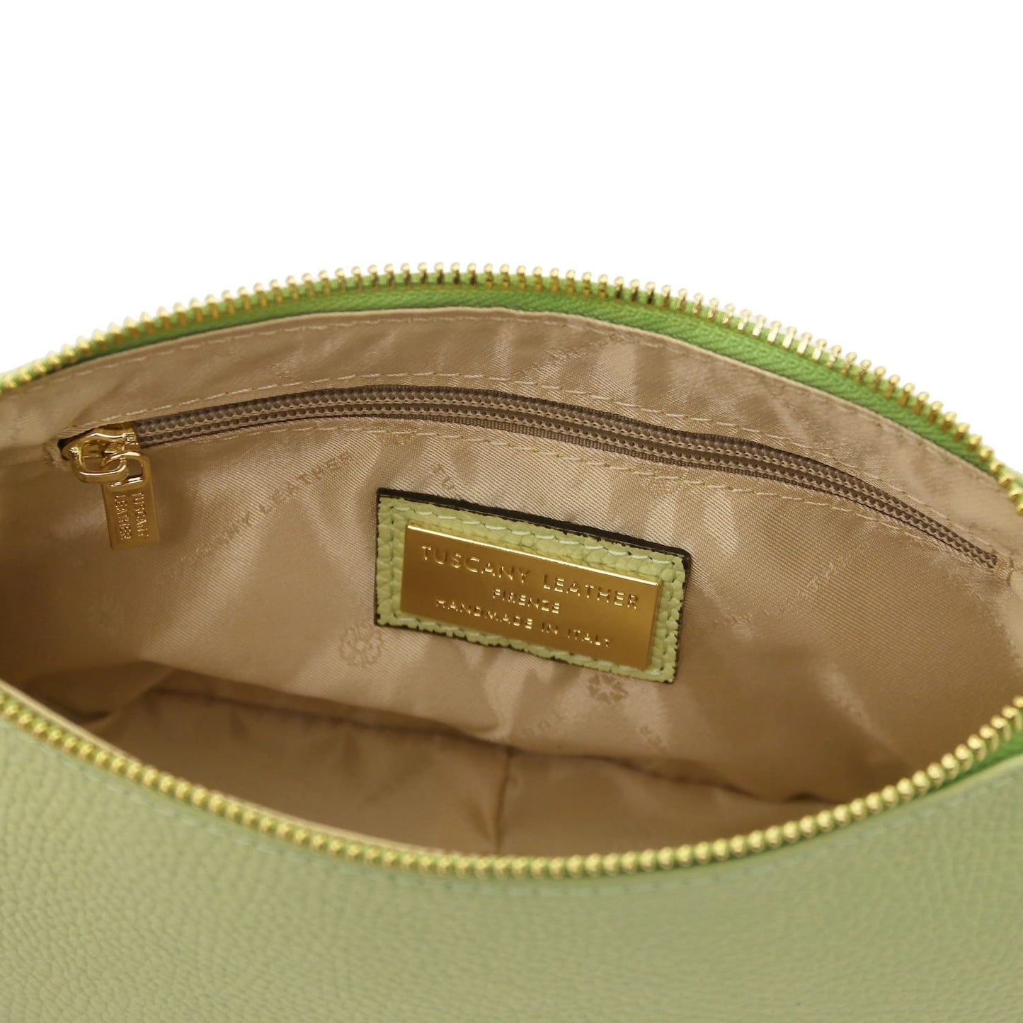 Bottom edge of lime green pebbled leather clutch with a centered seam and rounded base.