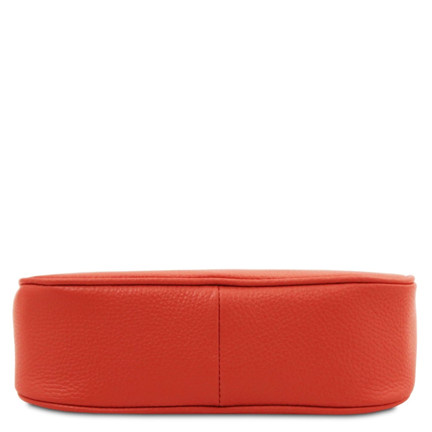 Parfait leather clutch in red with pebbled texture shown from a side view.