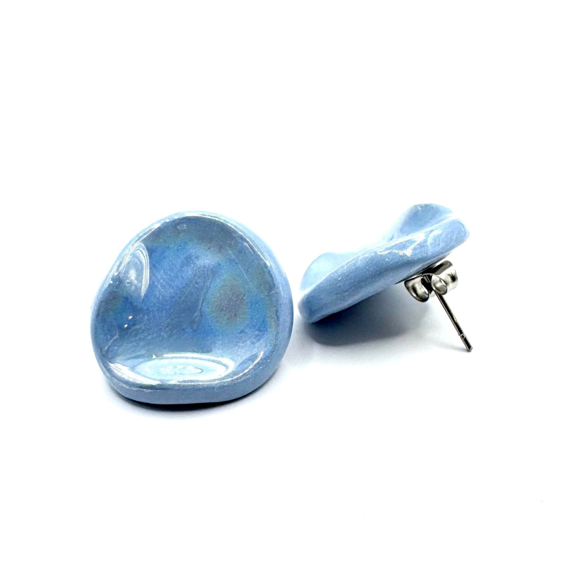 Pair of handcrafted light blue ceramic pearl stud earrings