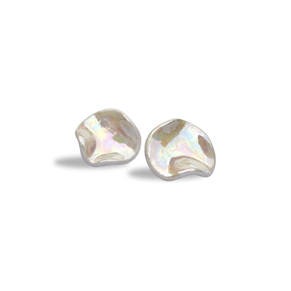 Pearl-white ceramic stud earrings with an irregular organic shape