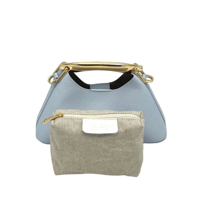 Light blue handbag with a gold zipper and inner beige pouch, on a white background.
