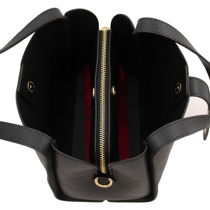 Inside view of the Soave handbag showing two compartments and a central zip divider with red lining