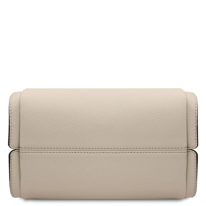 Beige soft leather handbag bottom panel with visible stitching.