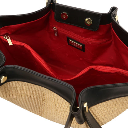 Red lined interior of the raffia bag with a zip pocket.