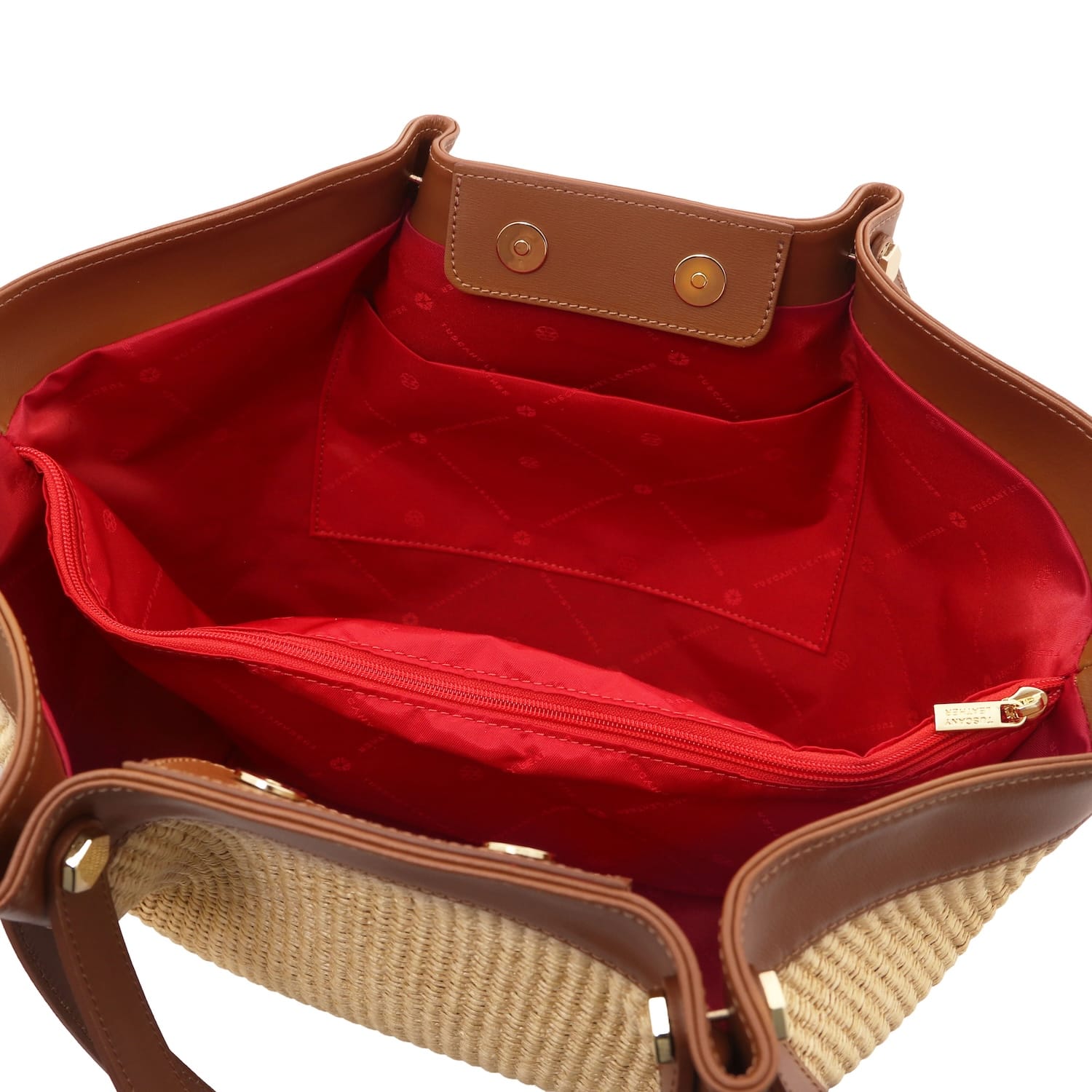 Inside view of Soleil Raffia shopping bag showing red lining and zip compartment with tan leather edging.