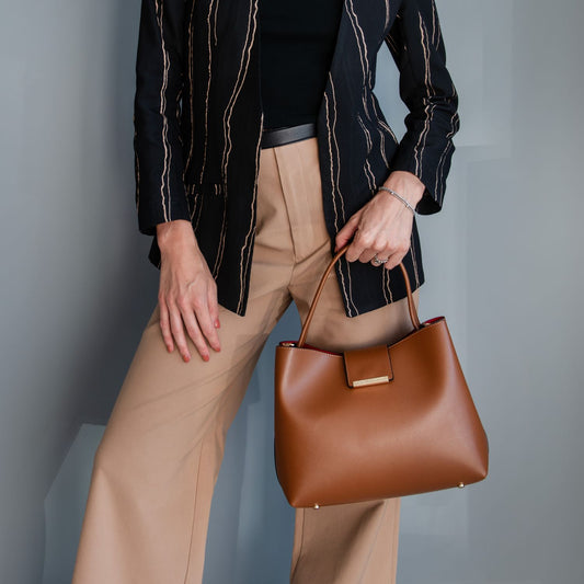 Clio - Palmellato leather bucket bag