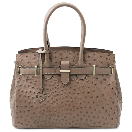 A structured taupe ostrich-print leather handbag with dual top handles, a front strap closure, and gold-tone hardware, shown against a plain white background.