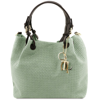 Green woven textured handbag with a gold keychain on a white background