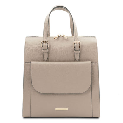 Light taupe convertible backpack handbag with a flap pocket on a white background
