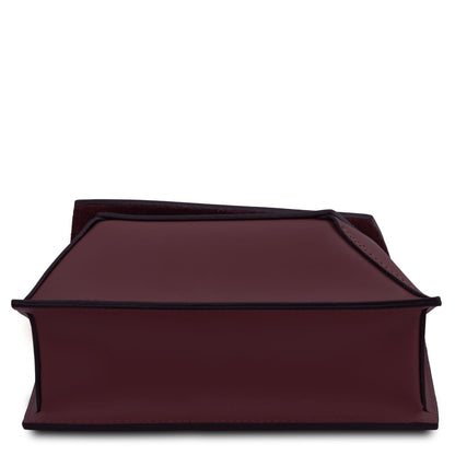TL Bag - Leather shoulder bag  | TL142253 in burgundy leather with geometric shape and black trim on white background