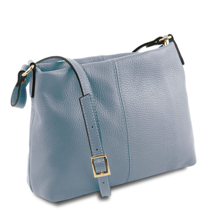 Soft blue full-grain leather shoulder bag with adjustable strap and gold-tone buckle hardware, made in Italy.