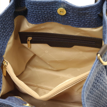 Interior of TL KeyLuck woven leather shopping bag with beige lining zip pocket and gold zipper pull