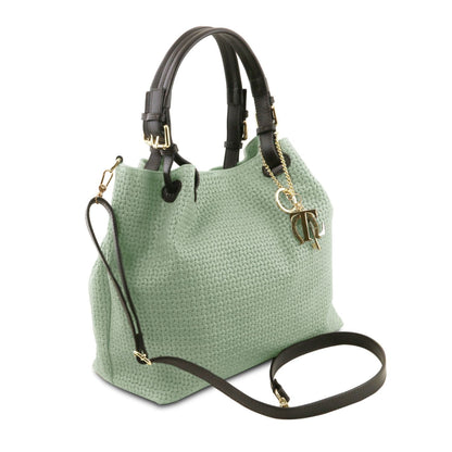 Mint green woven leather handbag with black top handles and detachable shoulder strap