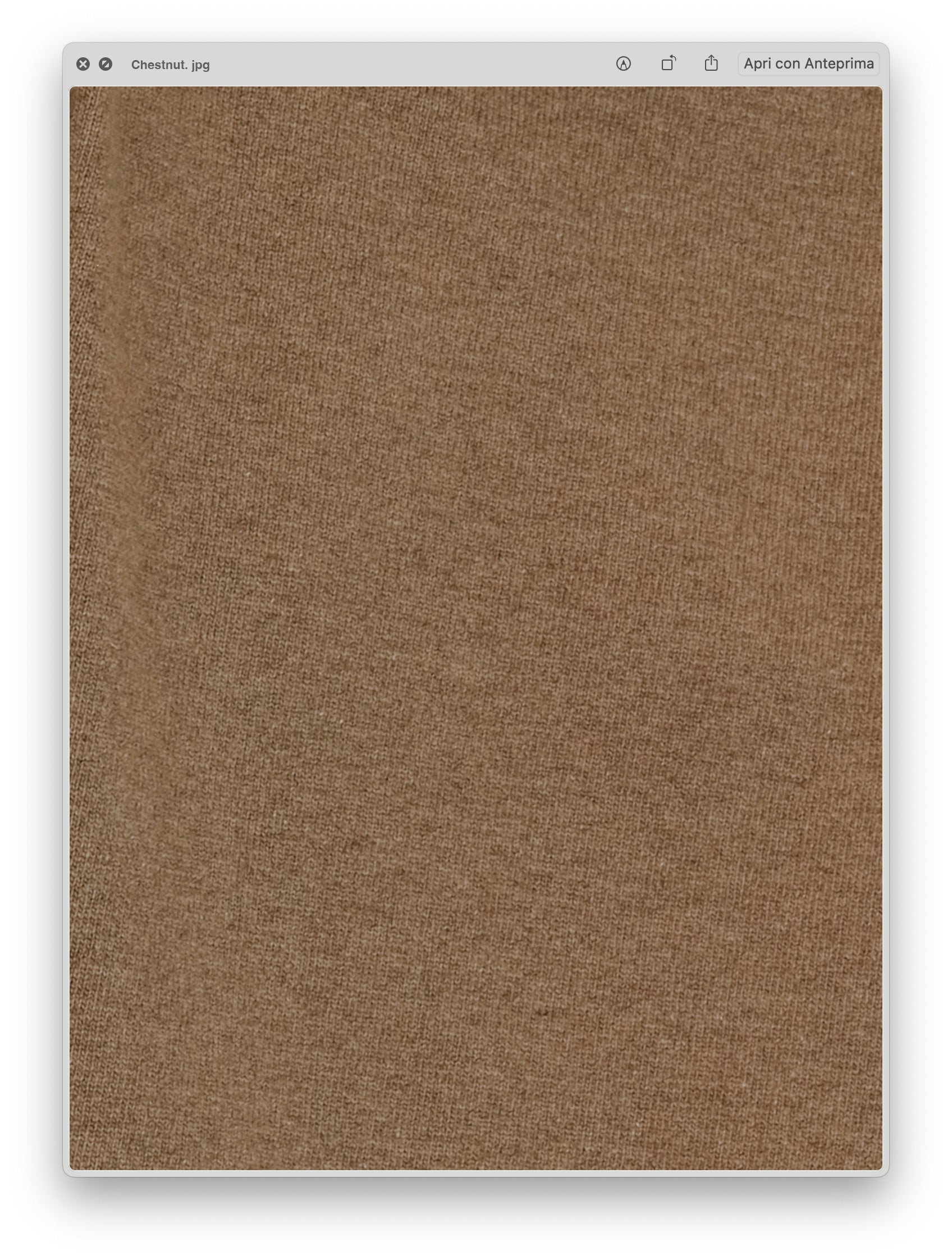 Close-up of soft chestnut brown fabric texture showing the fine knit detail of the Wool & Cashmere Mix Sleeveless Cable Knit Dress.