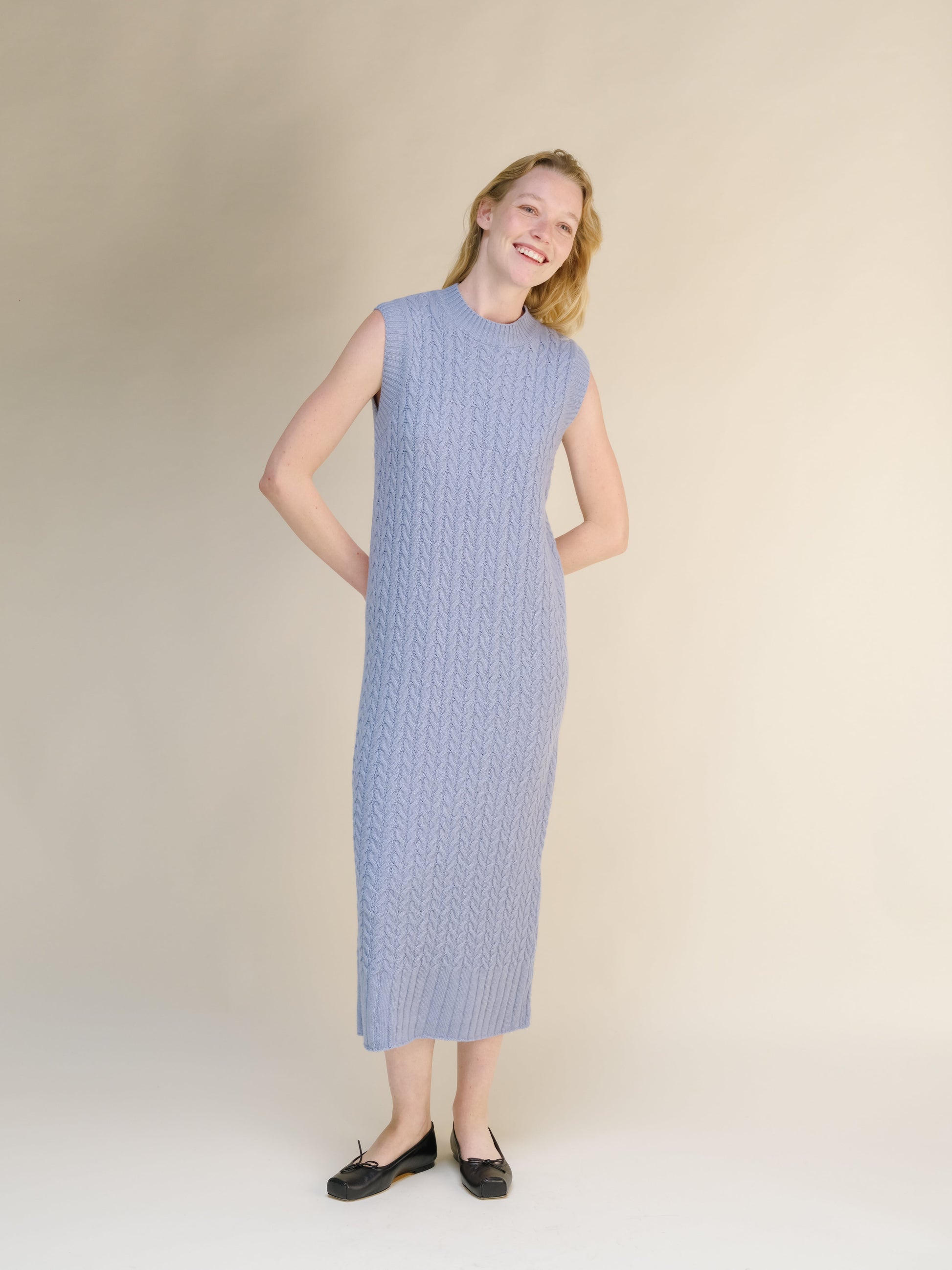 Wool & Cashmere Mix Sleeveless Cable Knit Dress in soft blue featuring a detailed cable pattern and a midi length silhouette.