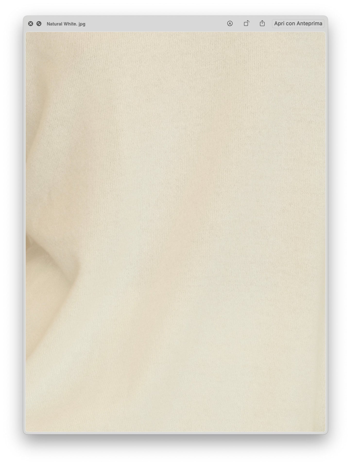 Close-up of soft natural white fabric texture showing fine knit detail of the Wool & Cashmere Mix Sleeveless Cable Knit Dress.