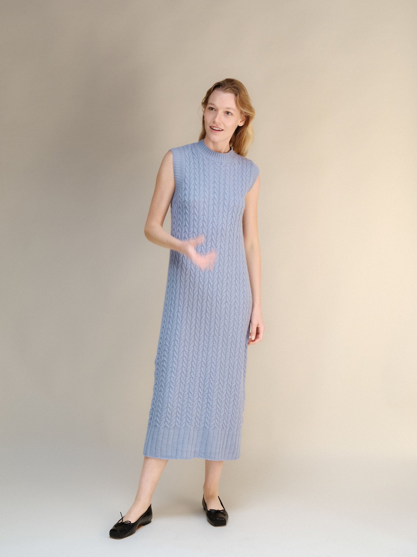 Wool & Cashmere Mix Sleeveless Cable Knit Dress in muted blue with a midi length and soft textured knit pattern.