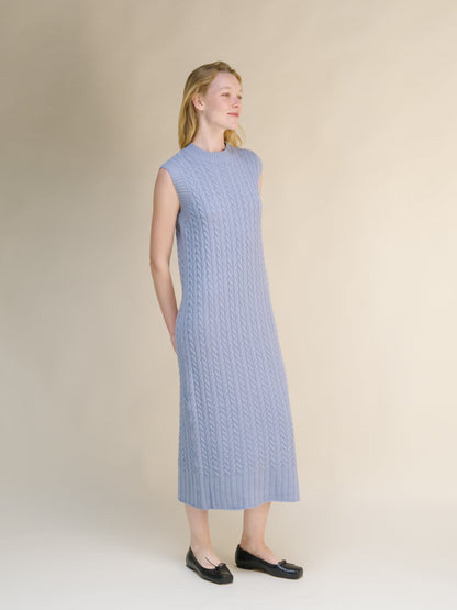 Wool & Cashmere Mix Sleeveless Cable Knit Dress in a soft blue with a midi length and intricate cable knit detailing.