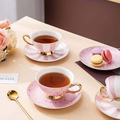 https://sanroccoitalia.it/cdn/shop/products/san-rocco-italia-coffee-tea-sets-pretty-in-pink-afternoon-tea-set-bone-china-cups-saucers-teapot-and-candle-teapot-warmer-38252548325596.jpg?v=1701127501&width=416